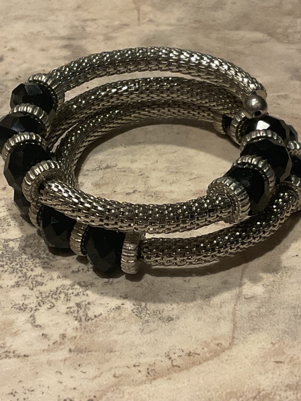 Silver-Tone Coil Bracelet with Black Faceted Beads
